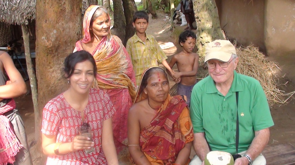 Sharing Coconut Water with the Harijan Community